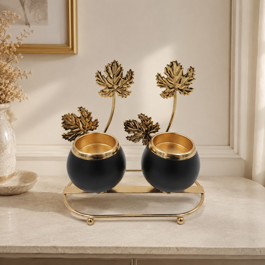Black and gold floral candleholder set for evening table styling