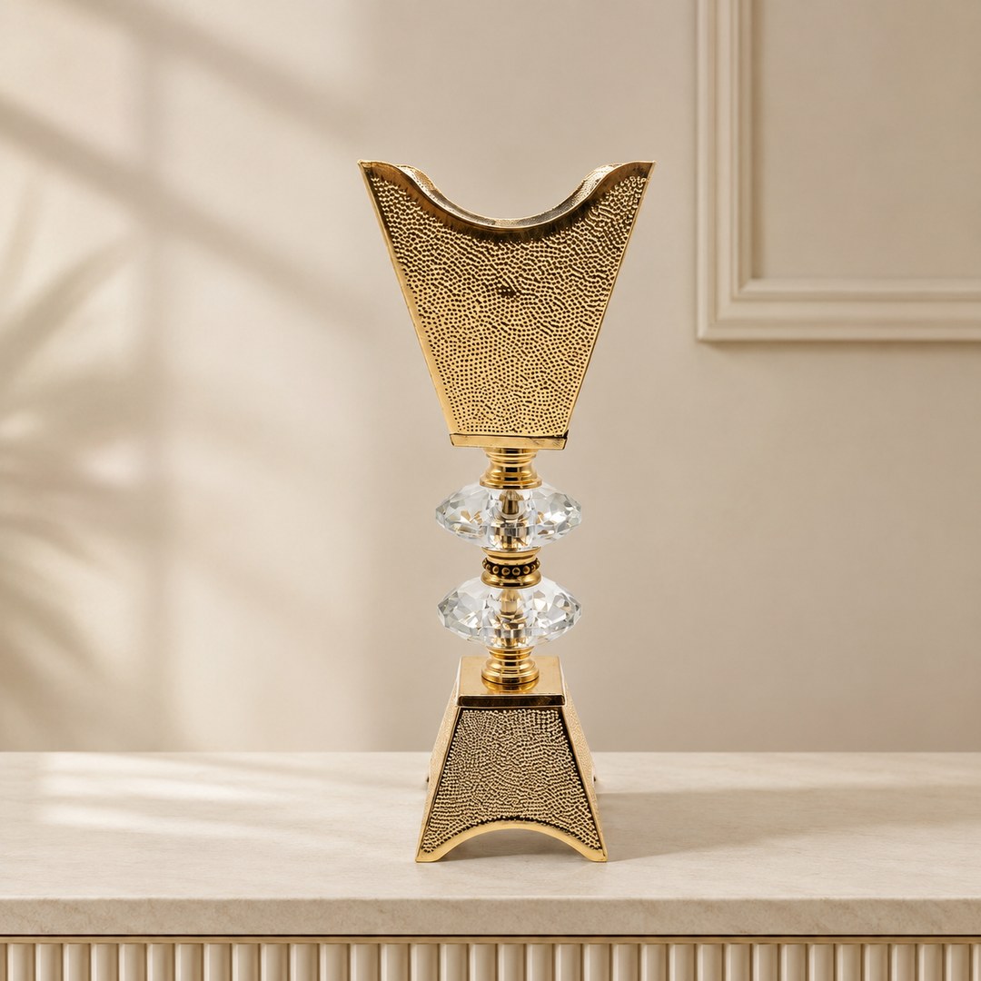 Gold crystal-look pedestal centrepiece with a narrow dining-table footprint
